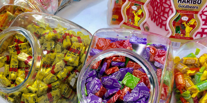 Assorted candies and sweets in containers.