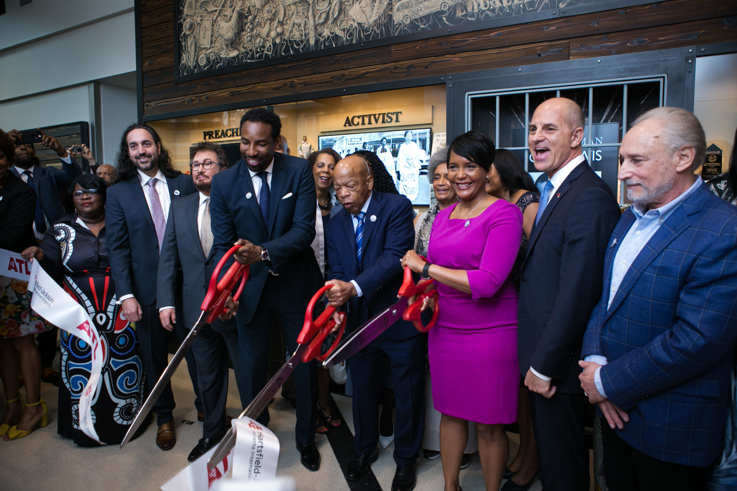 Congressman John Lewis tribute wall ribbon cutting. From left: Rachelle O'NeilAlexi Torres, RIck Baker, Andre Dickens, John Lewis, Keisha Lance Bottoms, John Selden, Gary Super