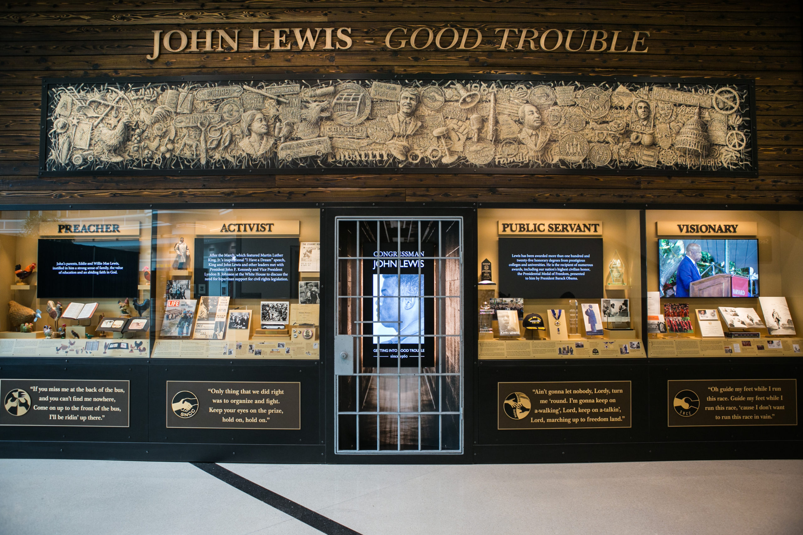 Wide view of entire wall display paying tribute to Congressman John Lewis
